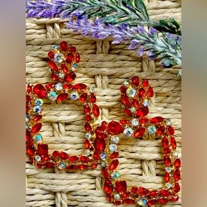 New red statement earrings